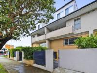 TWO STORY TWO BEDROOM TOWNHOUSE WITH PARKING