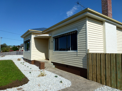 BARGAIN BUY - Renovated house on landscaped level grounds