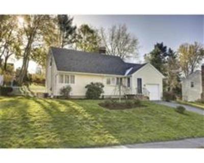 Lovely, bright updated home sited on a big lush yard