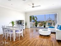Designer coastal haven with ocean outlook.