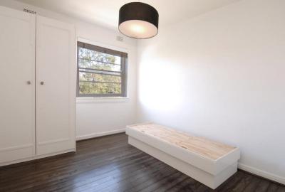 TWO BEDROOM & SUNROOM - WELL MAINTAINED BUILDING