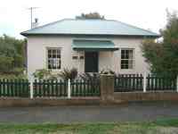 Lovely Georgian cottage on large block with established garden, in a quiet village but close to a major centre