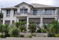 BESIDE THE SEA.  THIS MAGNIFICENT HOME OFFERS A GREAT BEACH SIDE LIFESTYLE.  JUST 15 MINUTES FROM NEWCASTLE