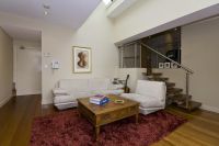 MODERN ONE BEDROOM, SPLIT LEVEL APARTMENT WITH SECURITY PARKING