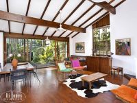 Private artist's haven with garden oasis and double garaging.