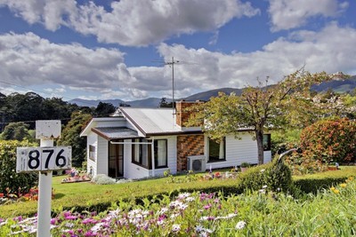 Cottage on 3 Titles