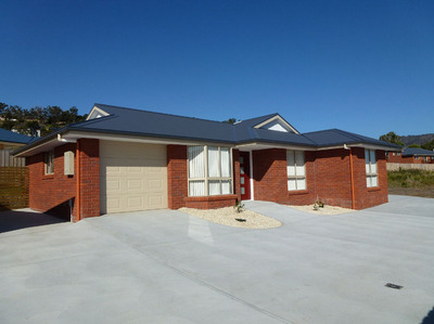 Spacious brand new three bedroom unit on level grounds