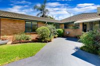 Versatile Family Living on Level Lawns with a Pool - Offers Over $870,000