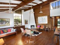 Private artist's haven with garden oasis and double garaging.