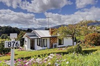 Cottage on 3 Titles