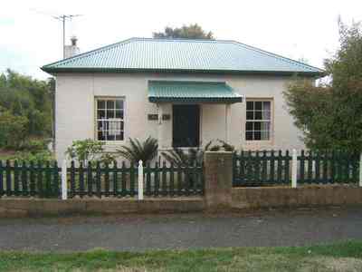 Lovely Georgian cottage on large block with established garden, in a quiet village but close to a major centre