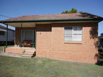 Neat Tidy Brick Home In Town!