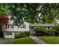 Absolutely immaculate oversized split/ranch in exclusive South Side location points to perfection!