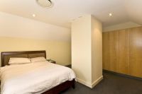 MODERN ONE BEDROOM, SPLIT LEVEL APARTMENT WITH SECURITY PARKING