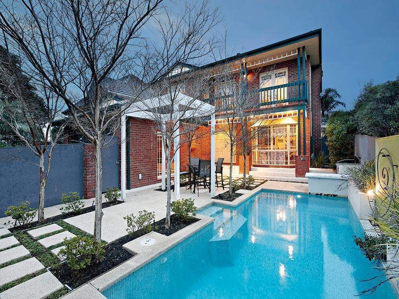 LOW MAINTENANCE POOLSIDE LIFESTYLE PROVIDES TEENAGE SPACE AND PARENTAL PEACE