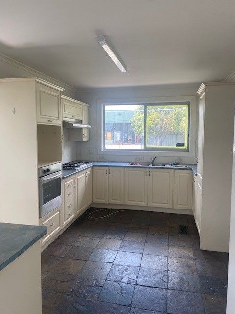 Hidden Gem in Fantastic Location ! Three bedrooms, work shop, double garage!