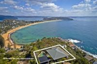 Classic beach house with a breathtaking backdrop