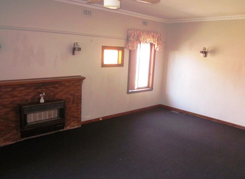 WELL- LOVED THREE BEDROOM HOME !