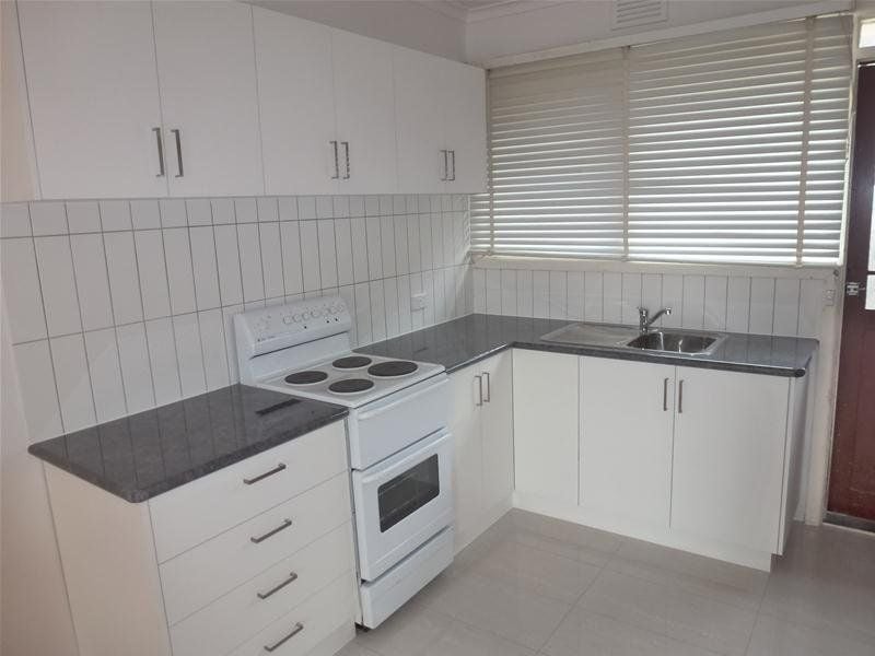 IDEALLY LOCATED TWO BEDROOM UNIT!