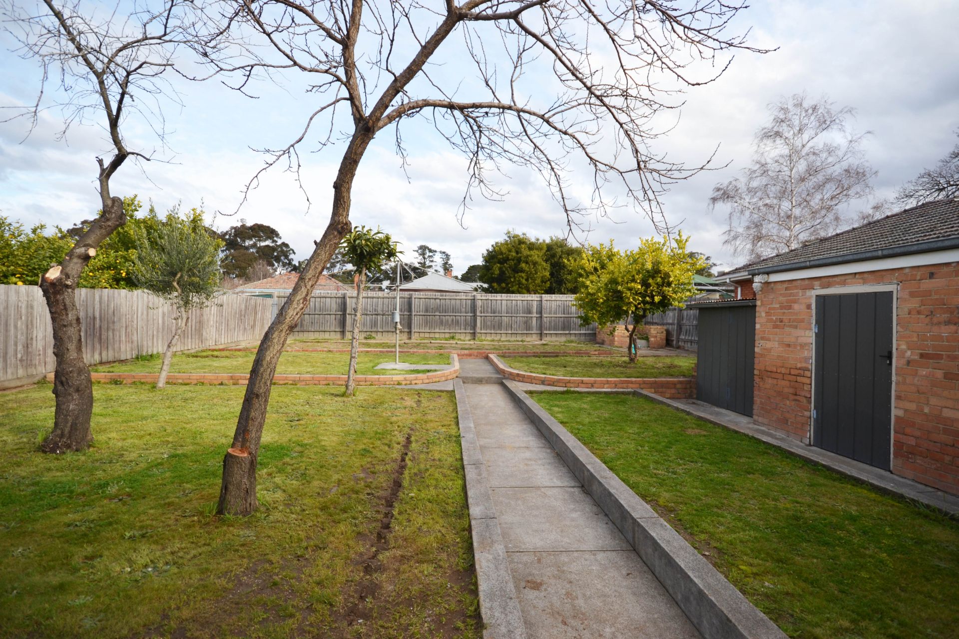 FRESHLY PAINTED THREE BEDROOM HOME