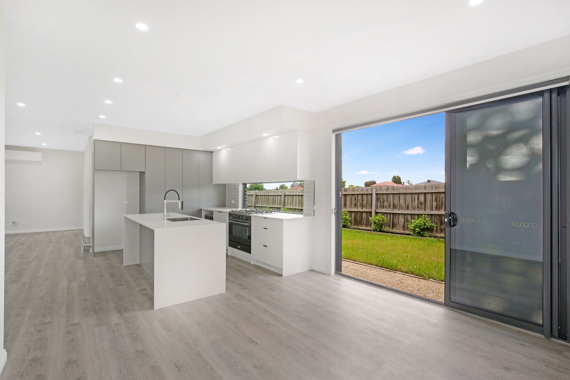 Chic and Modern Family Living Awaits in This Newly Built Family Home!