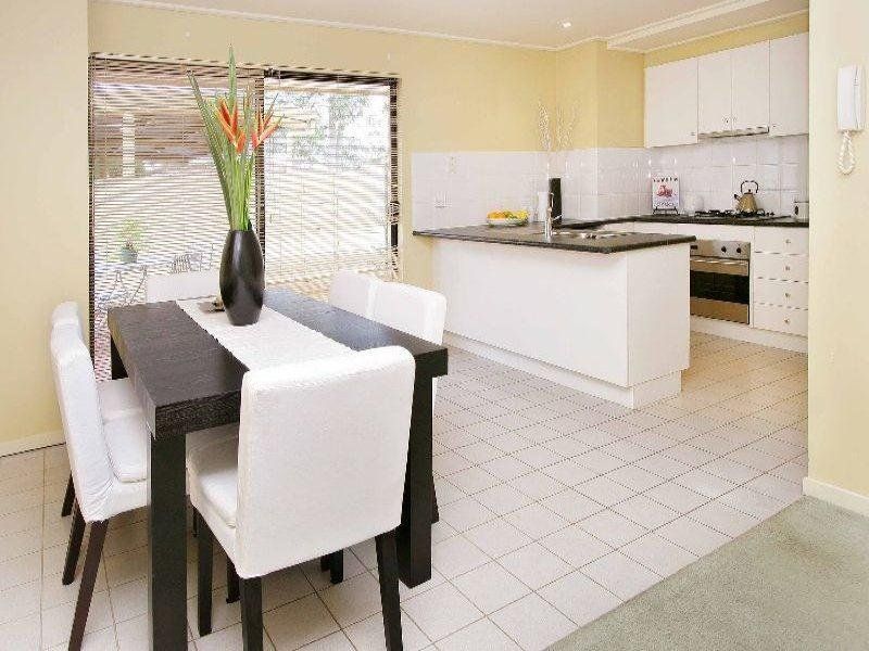 SECURE SOPHISTICATED SINGLE LEVEL APARTMENT !!!