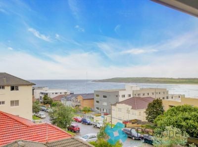 EXECUTIVE TWO BEDROOM BEACHSIDE RESIDENCE WITH EASTERLY OCEAN VIEWS