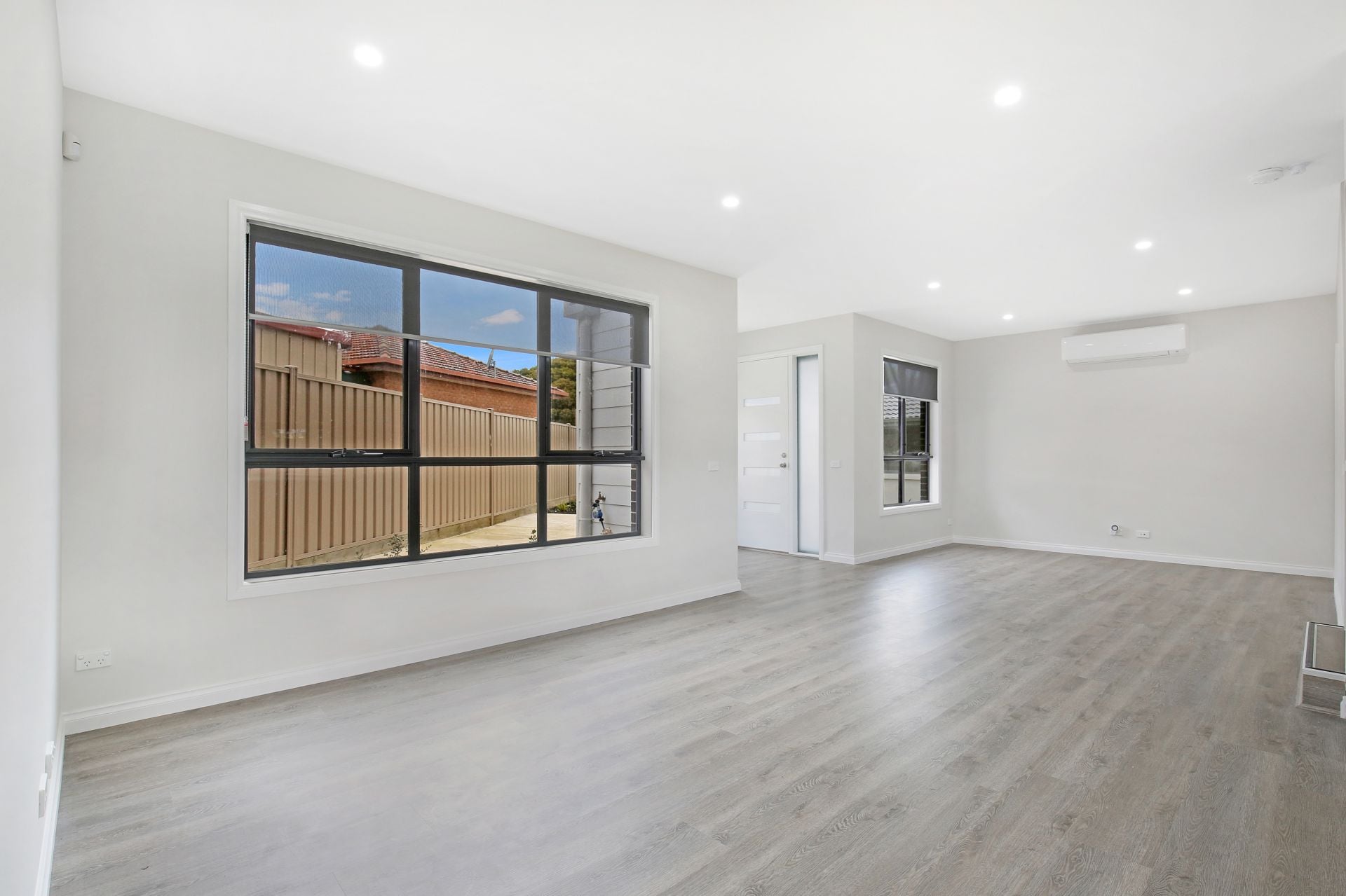 Chic and Modern Family Living Awaits in This Newly Built Family Home!