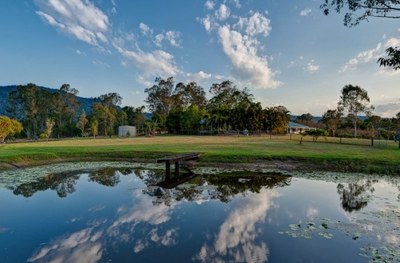 Privately positioned, spacious family entertainer on horse friendly acreage