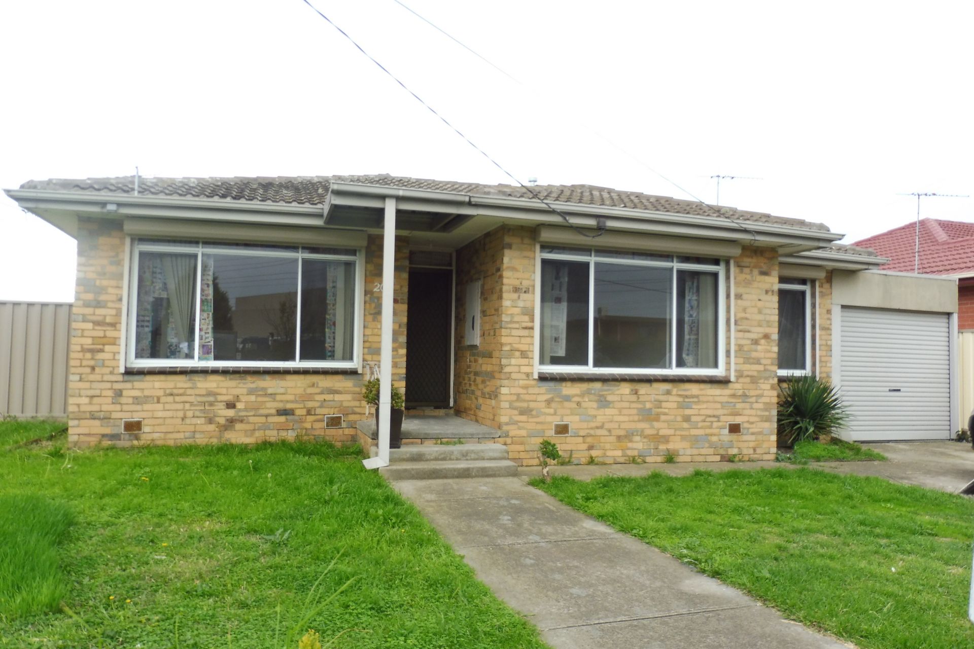 LOW MAINTENANCE PROPERTY IN AN IDEAL LOCATION