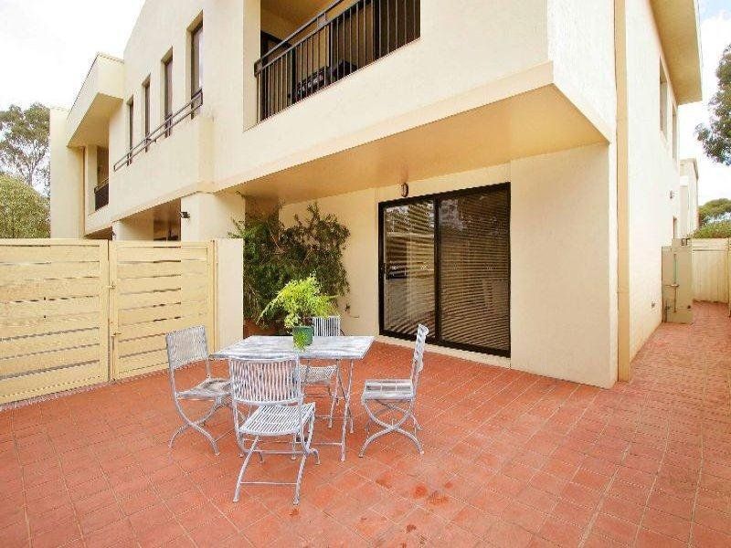 SECURE SOPHISTICATED SINGLE LEVEL APARTMENT !!!