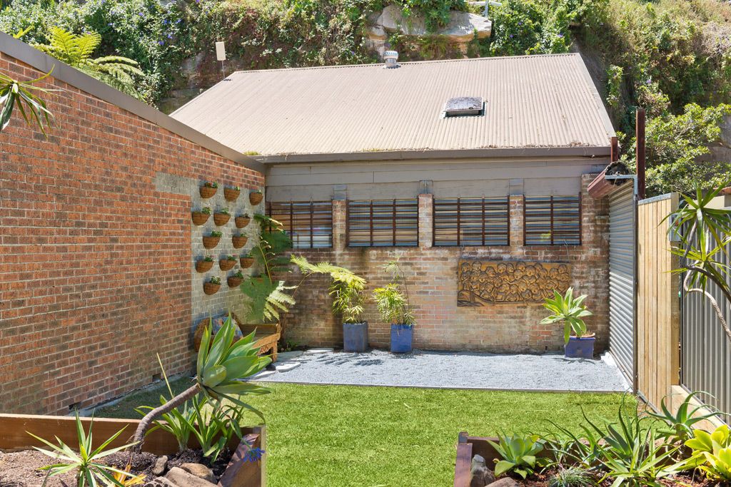 SOLD - Parkside Haven with Surprises of Space, Light and Style