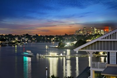 Deluxe two-storey penthouse offering light, space & views