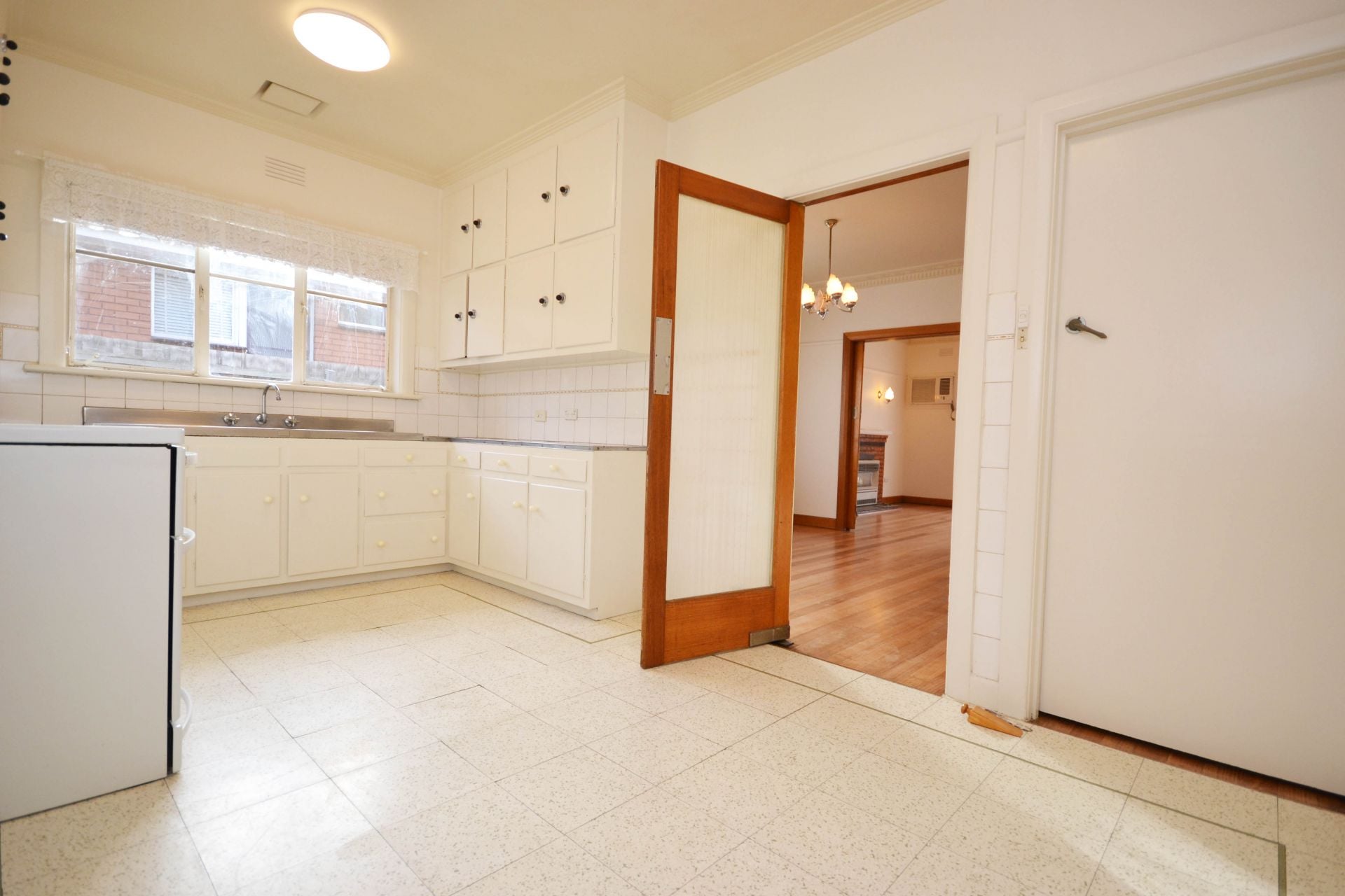 FRESHLY PAINTED THREE BEDROOM HOME