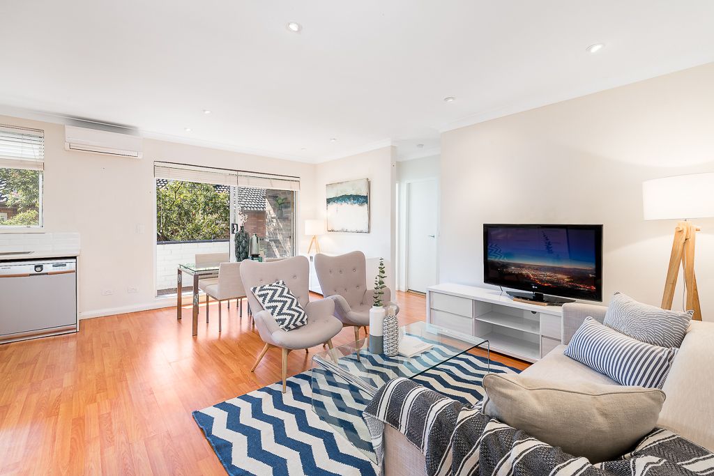 Sold - Renovated Top Floor Apartment with Large North Facing Balcony and Lock up Garage