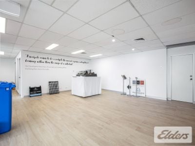 STRATEGICALLY POSITIONED OFFICE WITH 5 CARS!