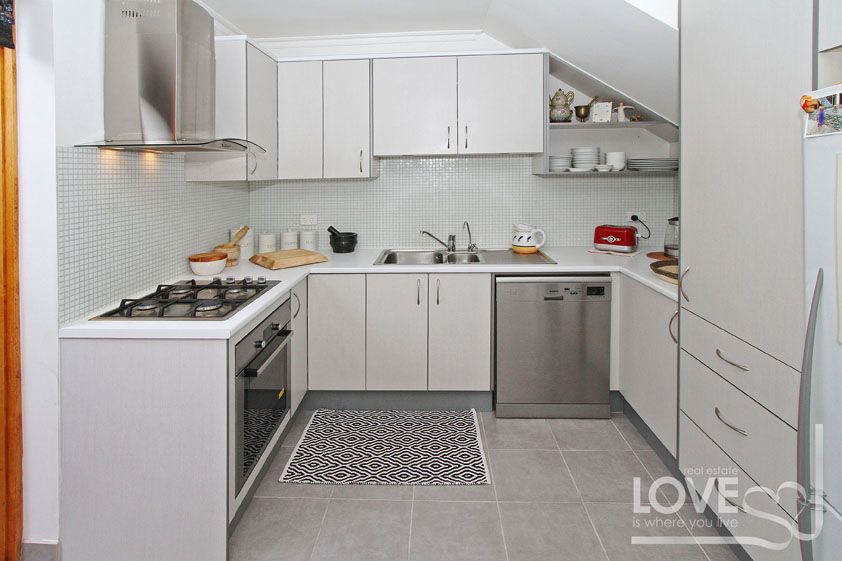 IMMACULATELY PRESENTED WITH THREE BEDROOMS