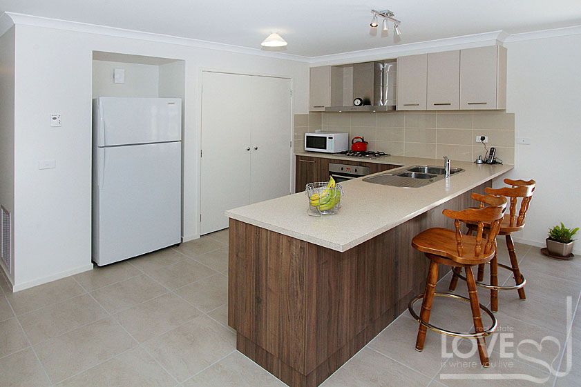 AFFORDABLE, MODERN, SPACIOUS FOUR BEDROOM BEAUTY!