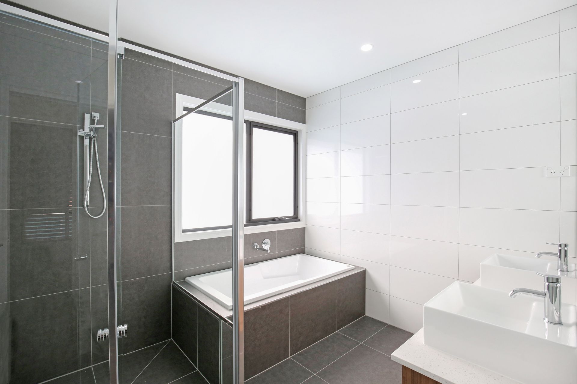 Chic and Modern Family Living Awaits in This Newly Built Family Home!