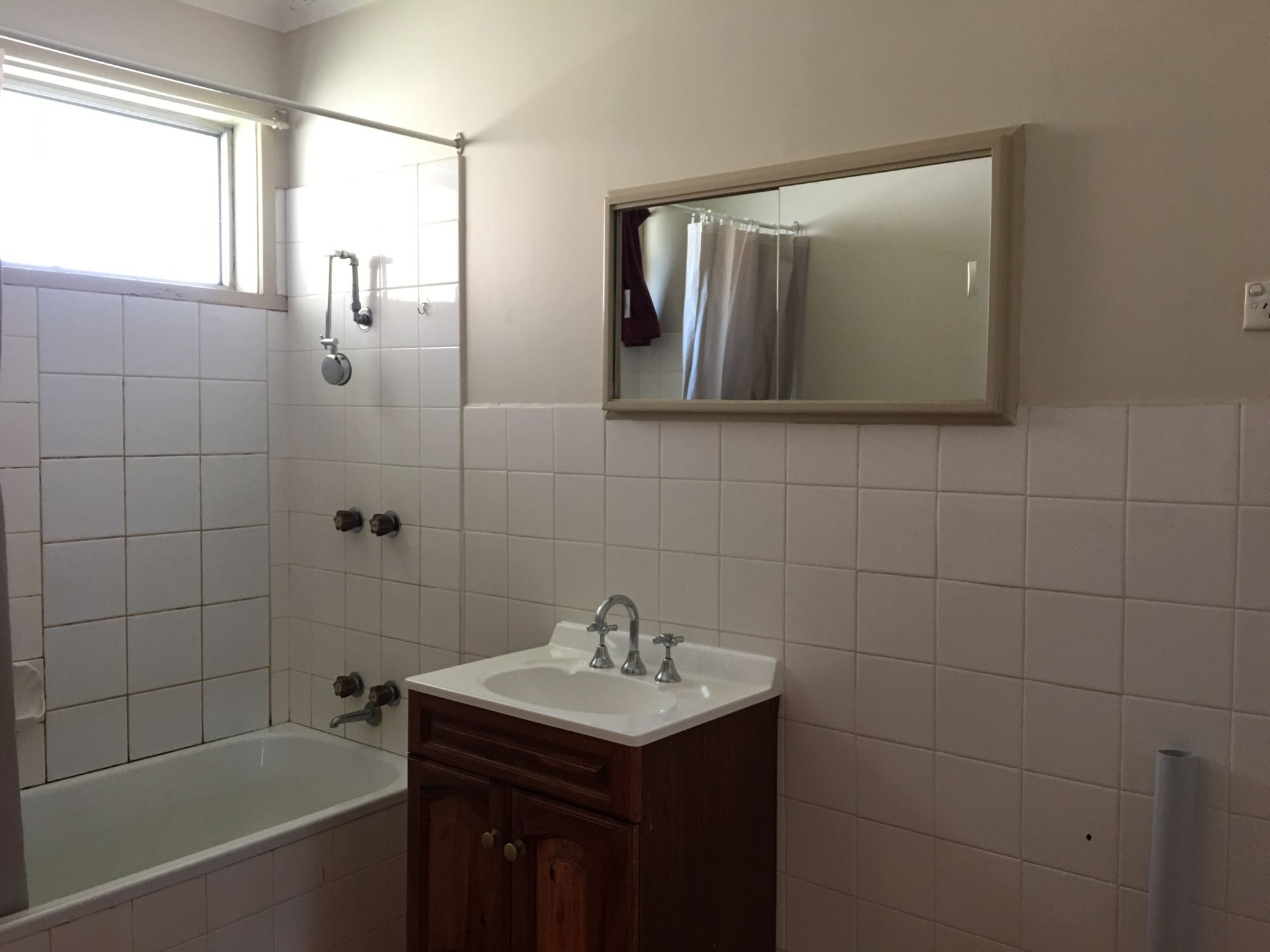 WELL LIT UNIT WITH CITY VIEWS!