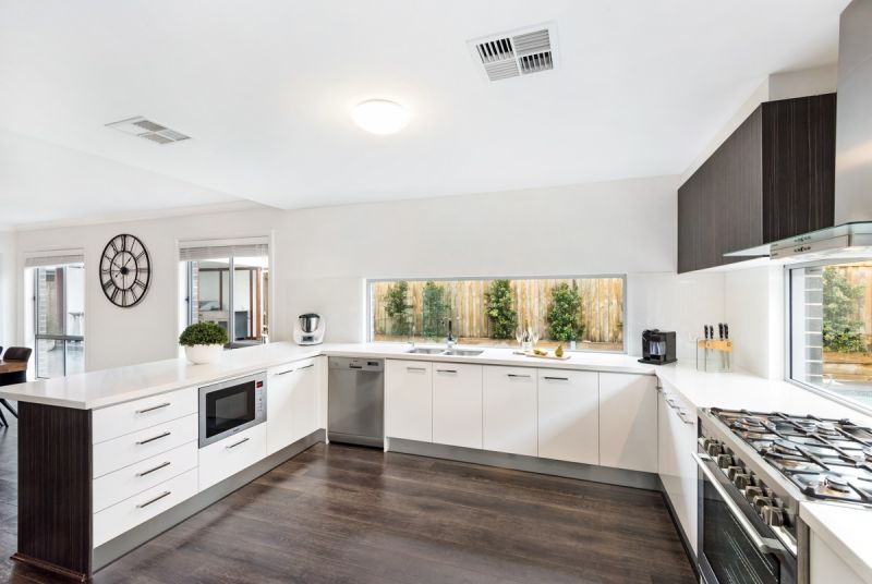 Relax and entertain in style by the beach