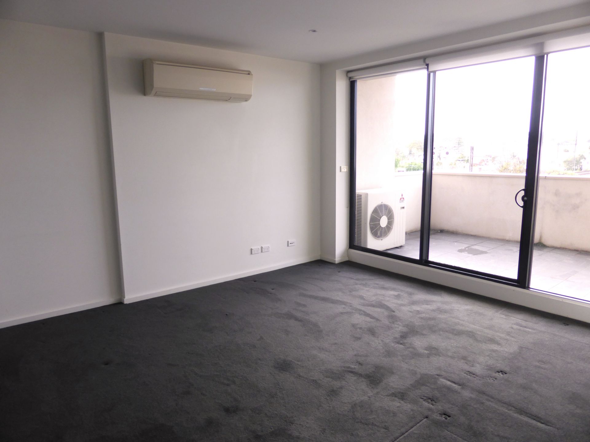 STYLISH AND LIGHT FILLED WITH BALCONY AND SECURE PARKING