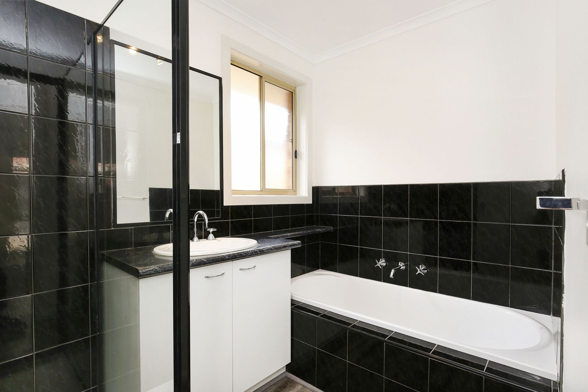 COMFORTABLE, CONVENIENT AND A GENEROUS BACKYARD