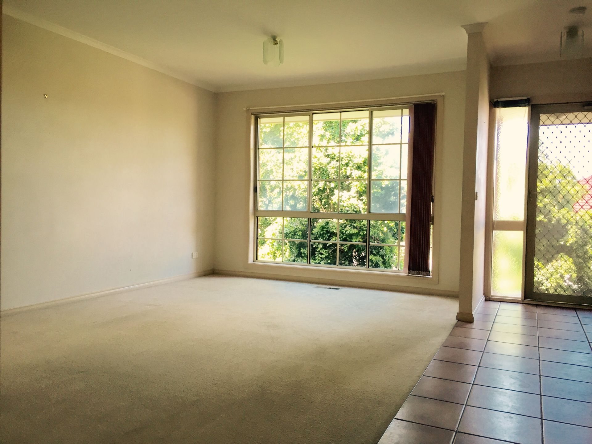 OPEN LIVING AREA BOTH INSIDE AND OUTSIDE, GREAT FOR THOSE BBQ SUMMER DAYS