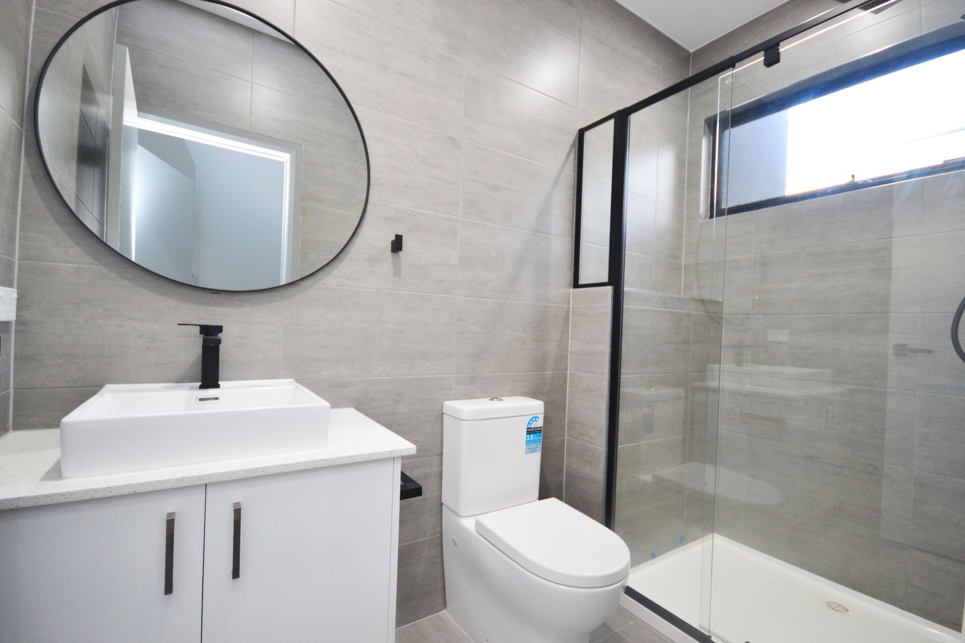 AS NEW THREE BEDROOM THREE BATHROOM TOWNHOUSE