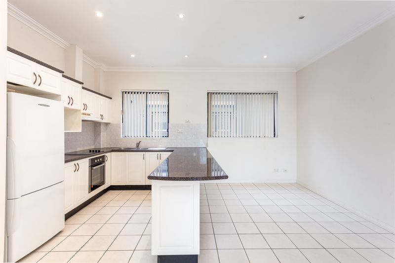 SUN-FILLED AND SPACIOUS APARTMENT