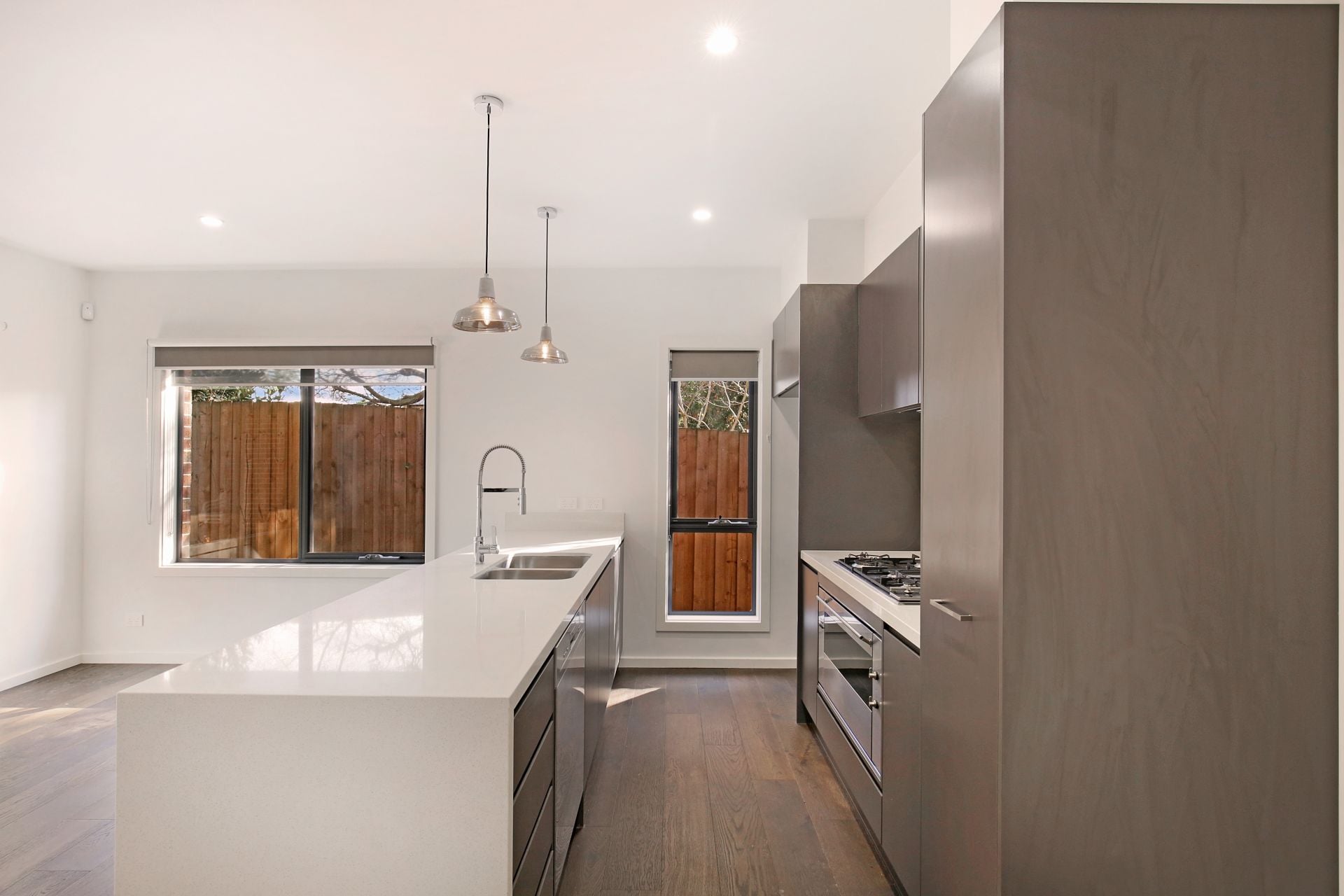 Immaculate, modern,  low maintenance and ready to call home!