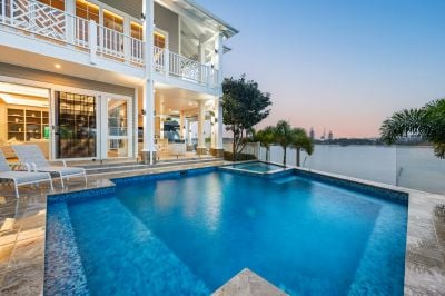 Luxurious Hamptons-Inspired Waterfront Residence in Prestigious Sovereign Islands