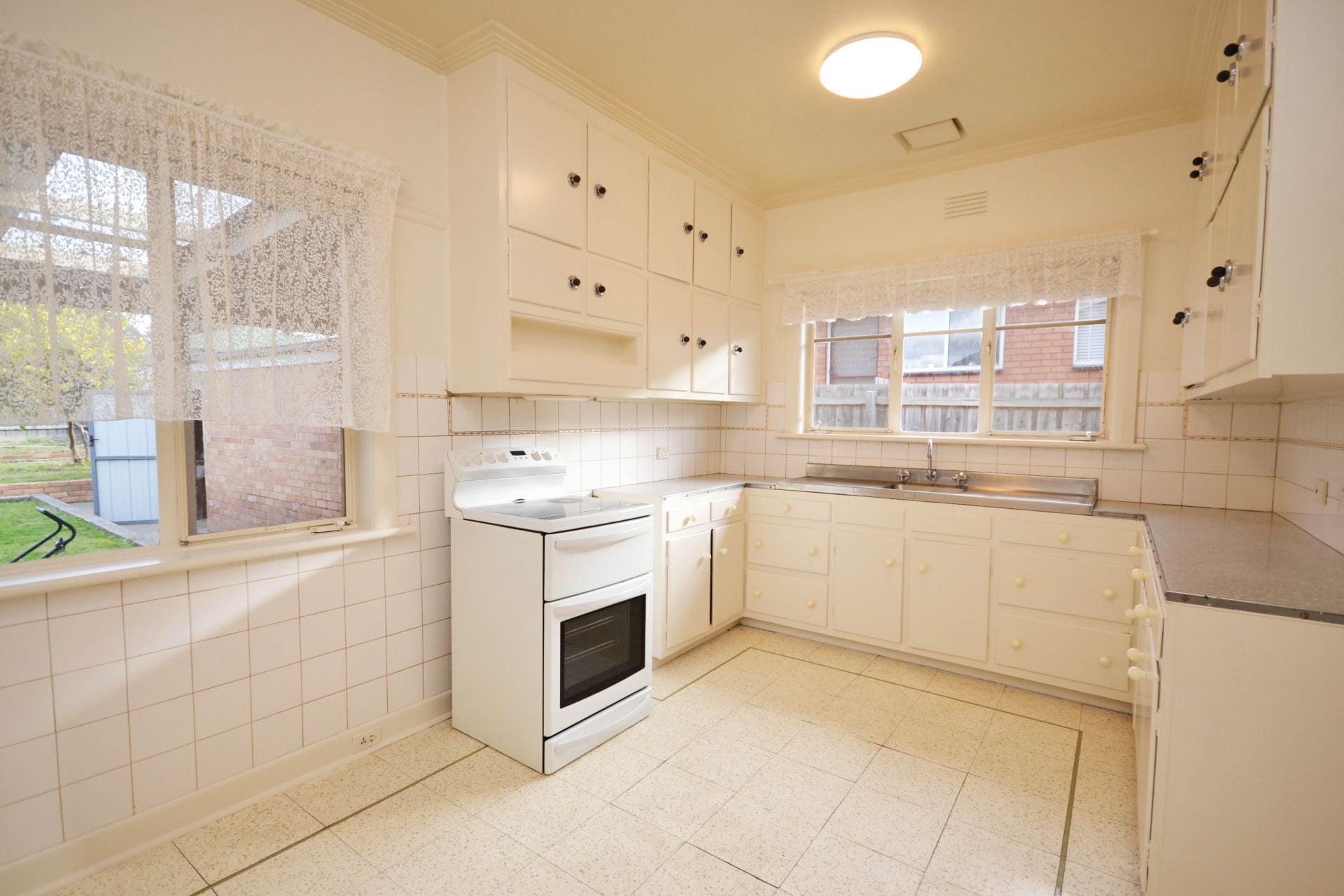 FRESHLY PAINTED THREE BEDROOM HOME