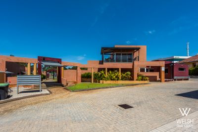 FURNISHED AND LOW MAINTENANCE WITH RESORT STYLE LIVING!